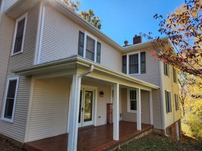 Corner view of a classic residential home, light exterior